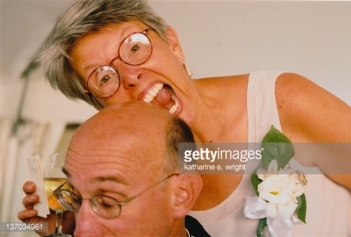 137034961-woman-take-big-bite-out-of-her-husband-bald-gettyimages.jpg
