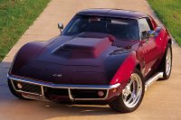0311vet_04z+1969_chevrolet_corvette_stingray+maroon_driver_side_front_view.jpg